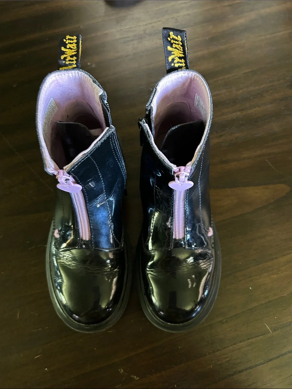 Dr. Martens Kids Black Patent Boots with Pink Trim and Pink Front Zip